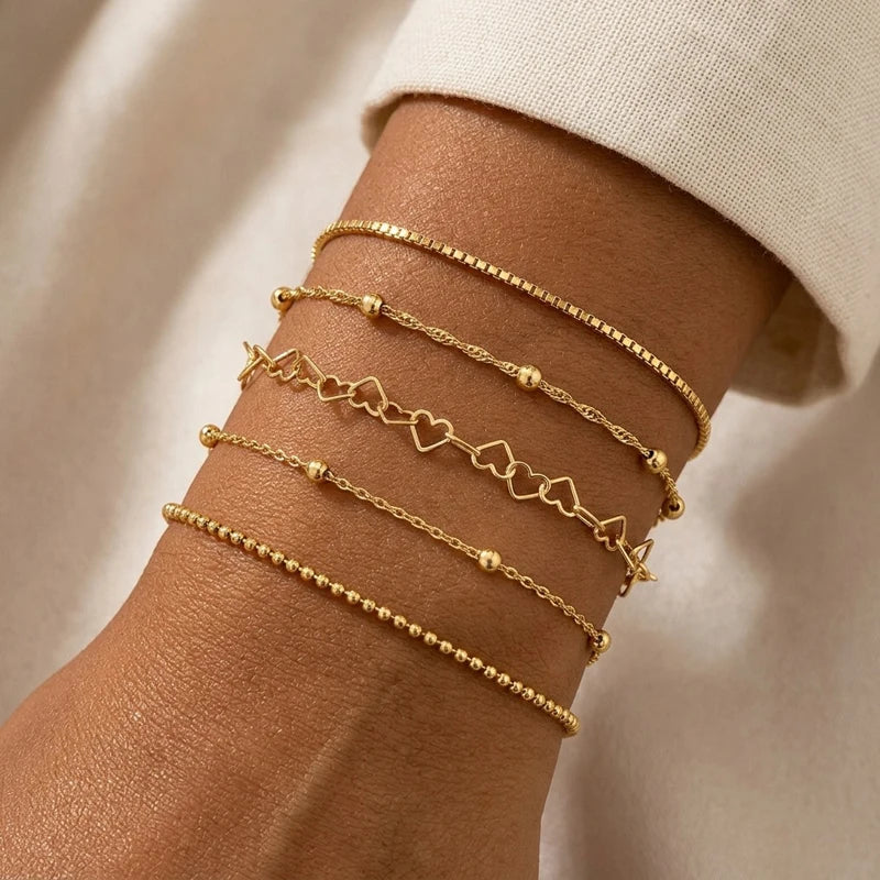 Set of 5 fine chain bracelets with hearts and beads, set of 5, gold-tone, King Watch