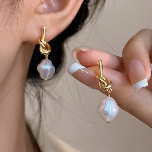 Pearl drop earrings on a gold-tone setting, view 2, King Watch