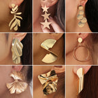 Gold-tone metal drop earrings, King Watch