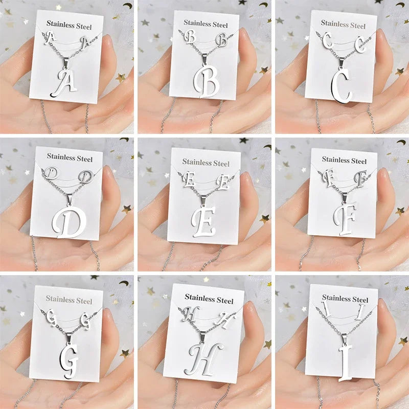Collier pendentif initiale en acier inoxydable, finition dorée ou argentée, vue 5, King Watch