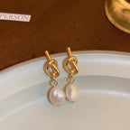 Pearl drop earrings on a gold-tone setting, view 4, King Watch